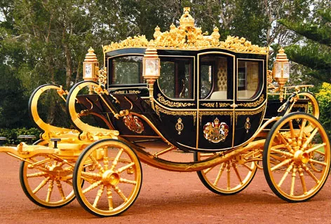 The Diamond Jubilee State Coach, an ornate black and gold horse-drawn state coach.